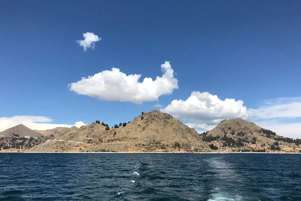 Lake Titicaca in Bolivia, Photo by Guido Coppa on Unsplash 