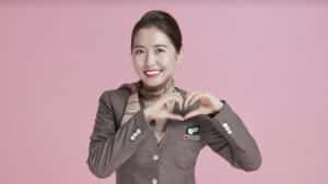 Why do flight attendants almost always wear a scarf? 3 Flight attendant wearing a scarf, photo: Phạm Duy Quang / Unsplash